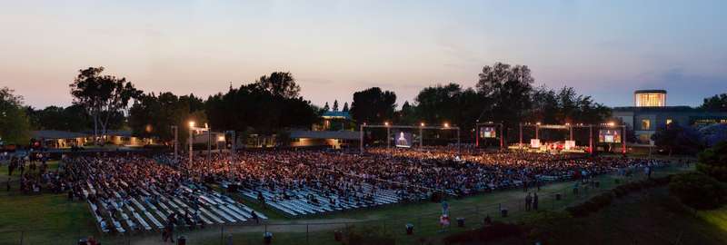 Commencement is set up in a large outdoor venue.