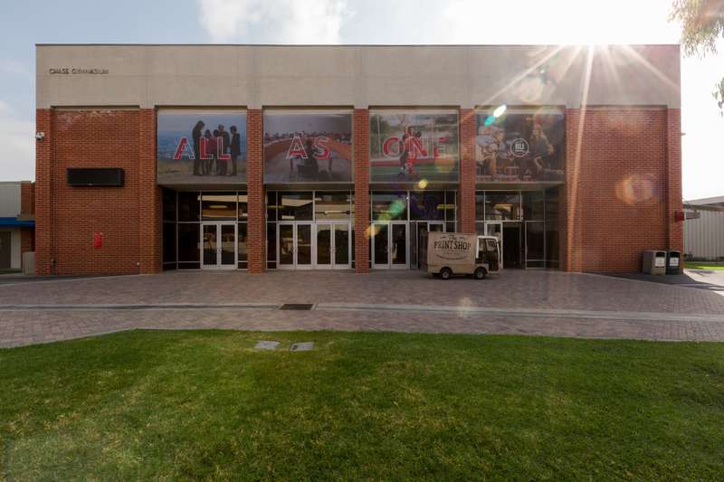 Banners with my photography hang outside Chase Gymnasium at Biola University