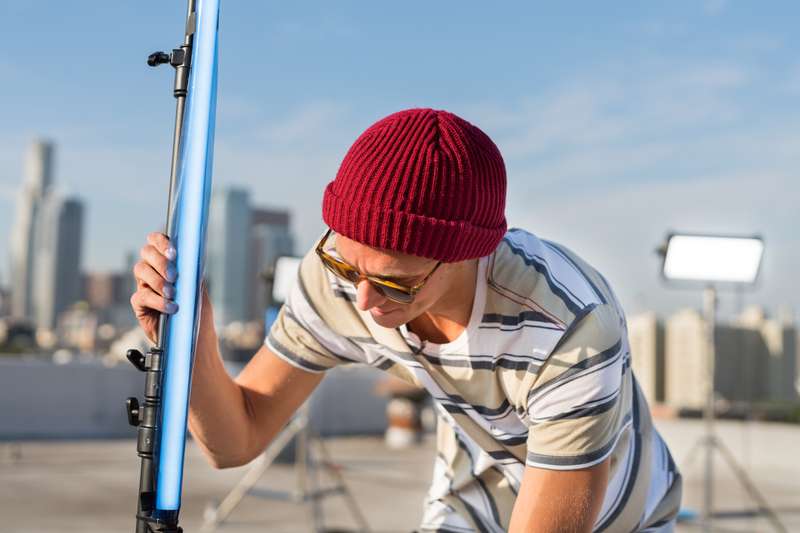 A student sets up a light