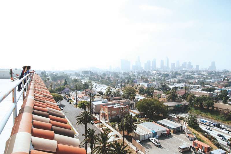 Students standing on top of the Dream Center, overlooking Los Angeles