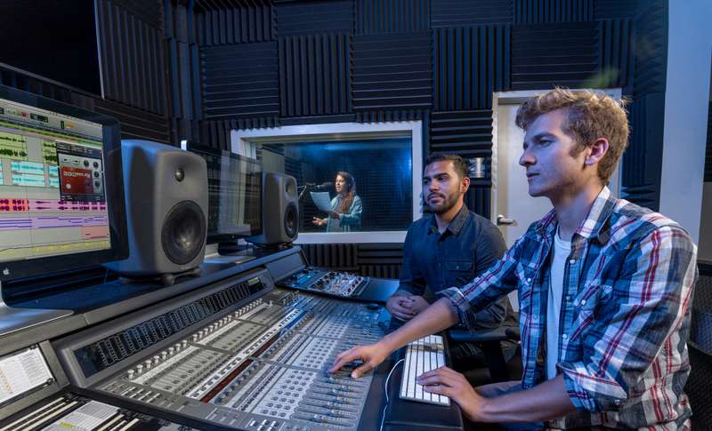 Students use the audio mixing suite